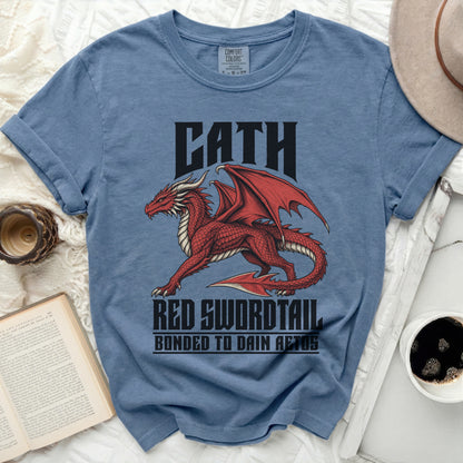 Blue t-shirt with red dragon graphic and text "CATH RED SWORDTAIL BONDED TO DAIN AETOS".
