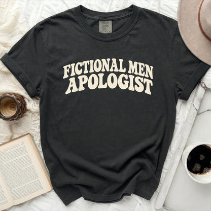 Black t-shirt with "Fictional Men Apologist" in cream text.