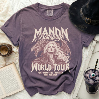 Purple t-shirt with Manon Blackbeak World Tour dragon and woman graphic.