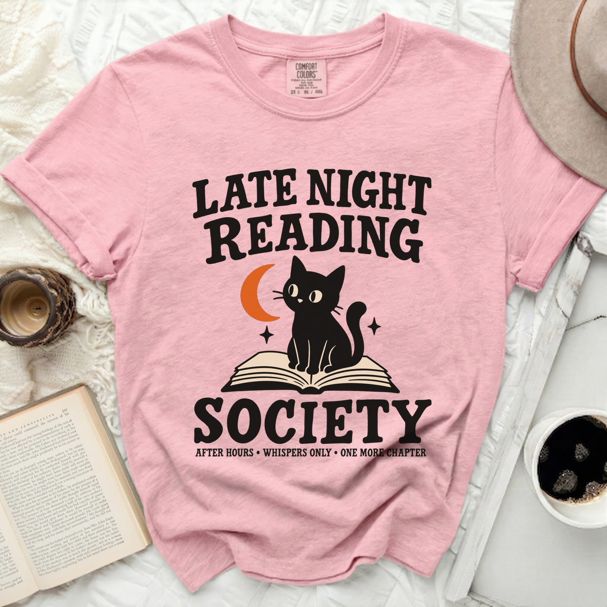 Pink t-shirt with "Late Night Reading Society" text and a black cat.
