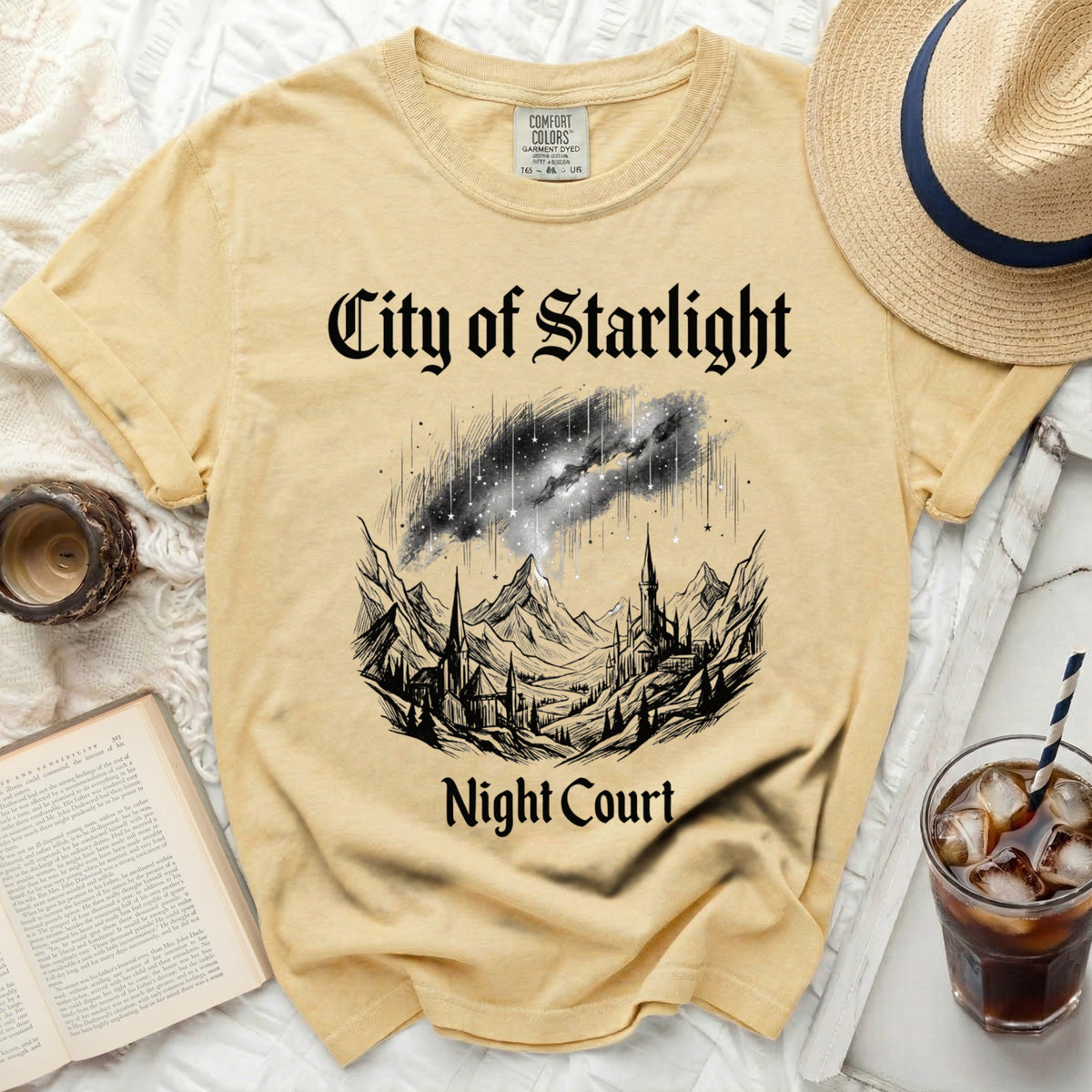 Yellow t-shirt with "City of Starlight Night Court" gothic font graphic.