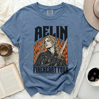Blue t-shirt with Aelin "Fireheart Tour" graphic featuring a woman with a sword and flames.