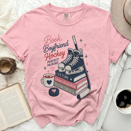 Graphic tee with "Book Boyfriend Hockey" and hockey theme.