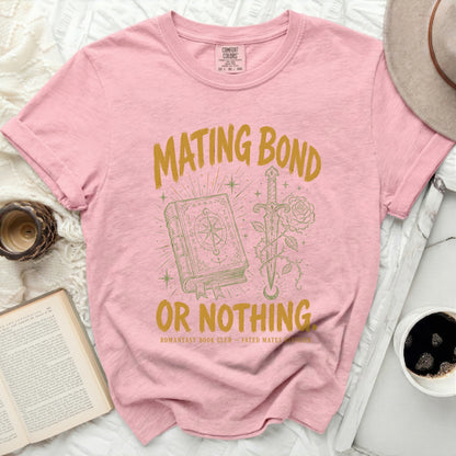 Pink t-shirt with "Mating Bond" text, open book, sword, and rose.