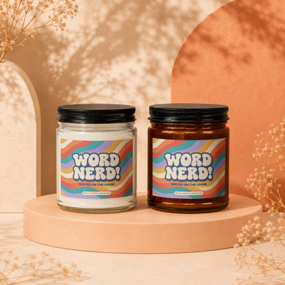 Two candles with "WORD NERD! WRITER ON THE LOOSE" labels and wavy colorful designs.