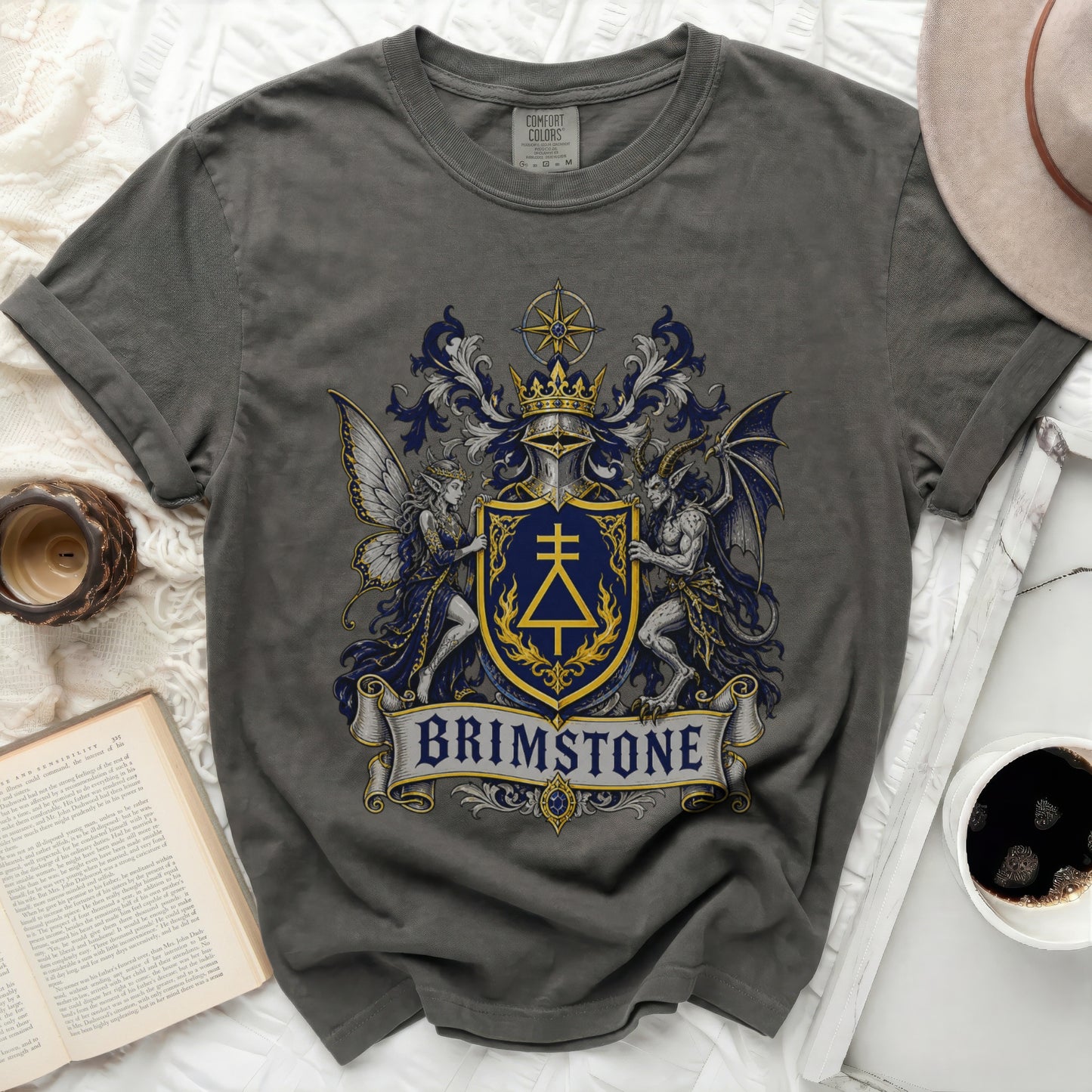 Gray t-shirt with a crest featuring a dragon, fairy, and banner reading "BRIMSTONE".