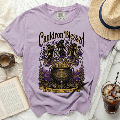 Purple t-shirt with "Cauldron Blessed Nesta Archeron" graphic.