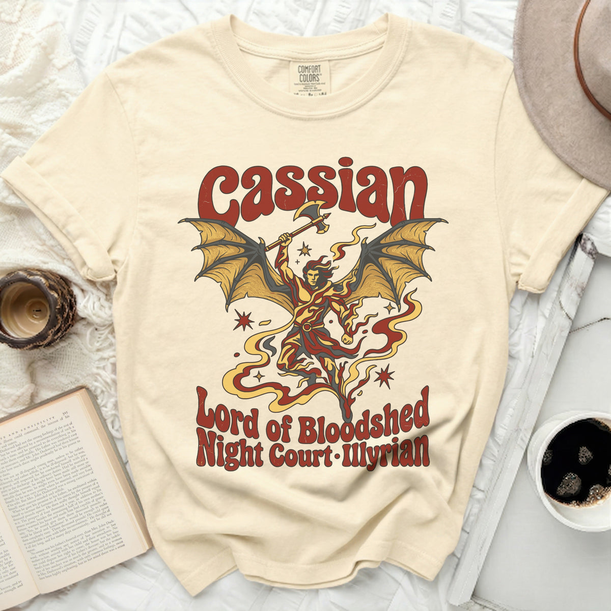 Cream t-shirt with "Cassian Lord of Bloodshed Night Court Illyrian" graphic.