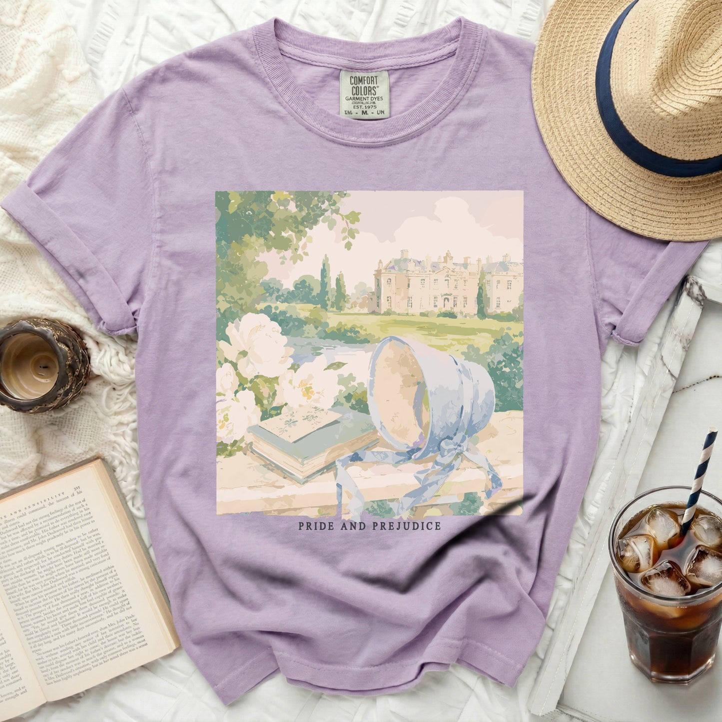 Purple t-shirt with Jane Austen's "Pride and Prejudice" castle graphic.