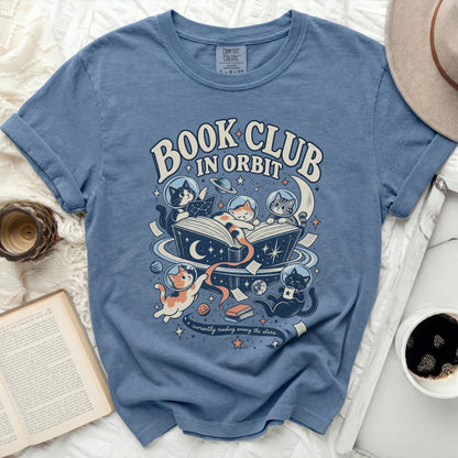 T-shirt with "Book Club in Orbit" text and cats reading in space.