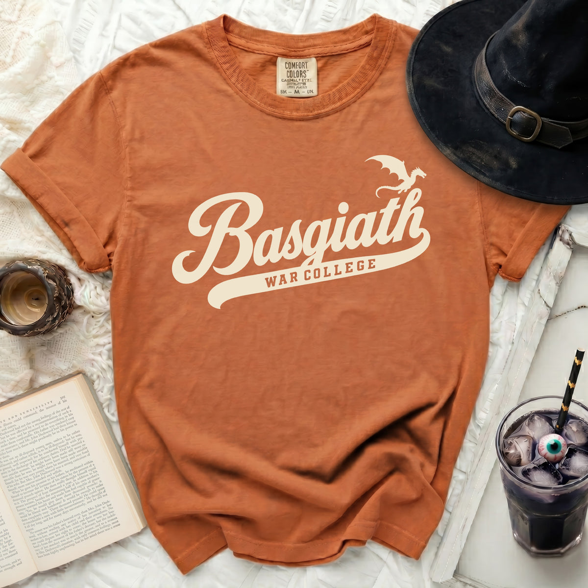 Orange t-shirt with "Basgiath War College" and dragon logo.
