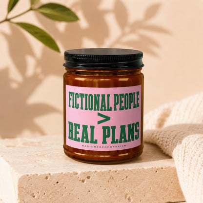 Amber jar candle with black lid labeled "Fictional People > Real Plans".