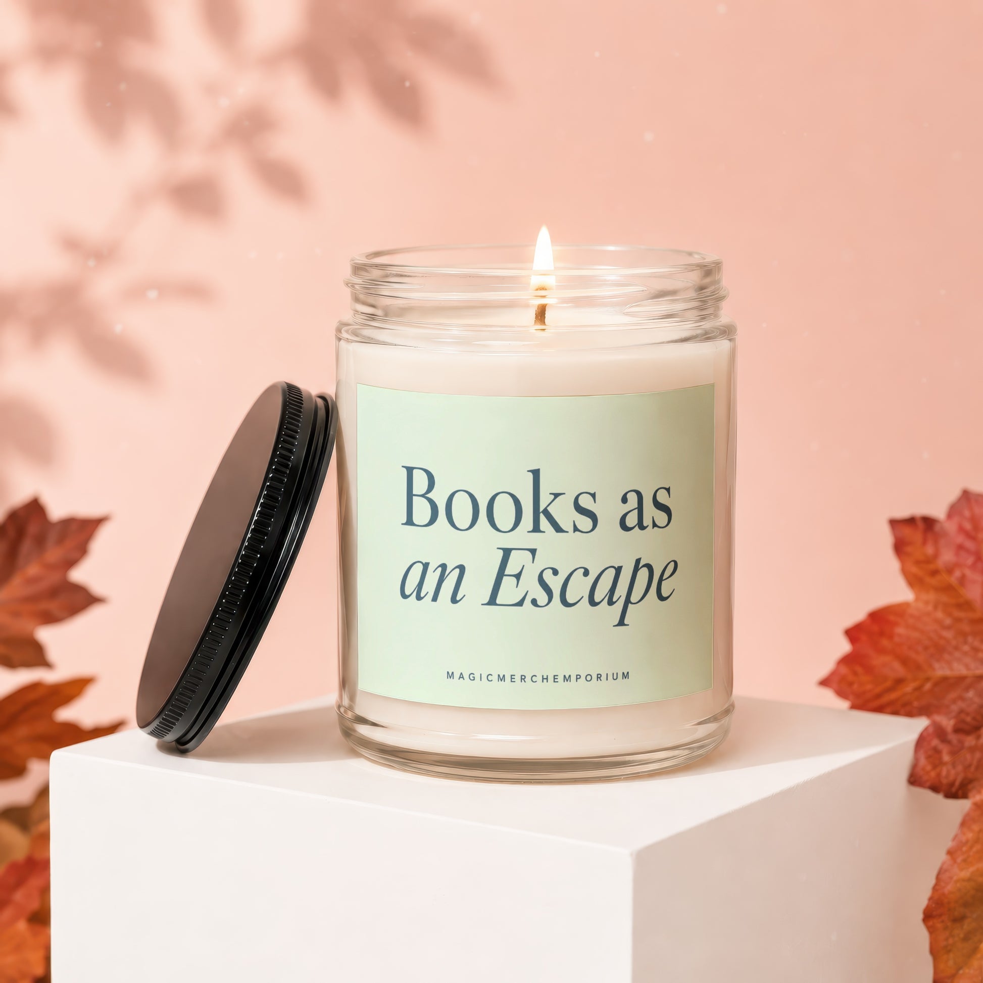 Candle with light, "Books as an Escape" text, and black lid on cube.