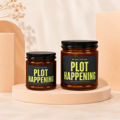 Two amber glass candles with black lids and labels reading "DO NOT DISTURB: PLOT HAPPENING".
