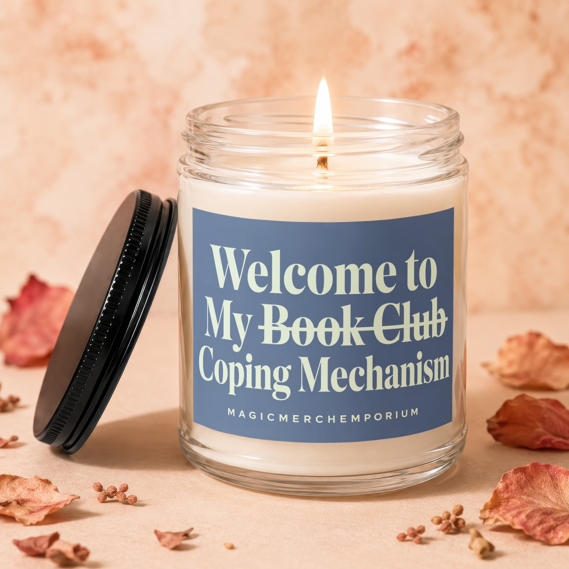 Glass candle with "Welcome to My Book Club Coping Mechanism" and "MAGICMERCHEVMPORIUM" text.