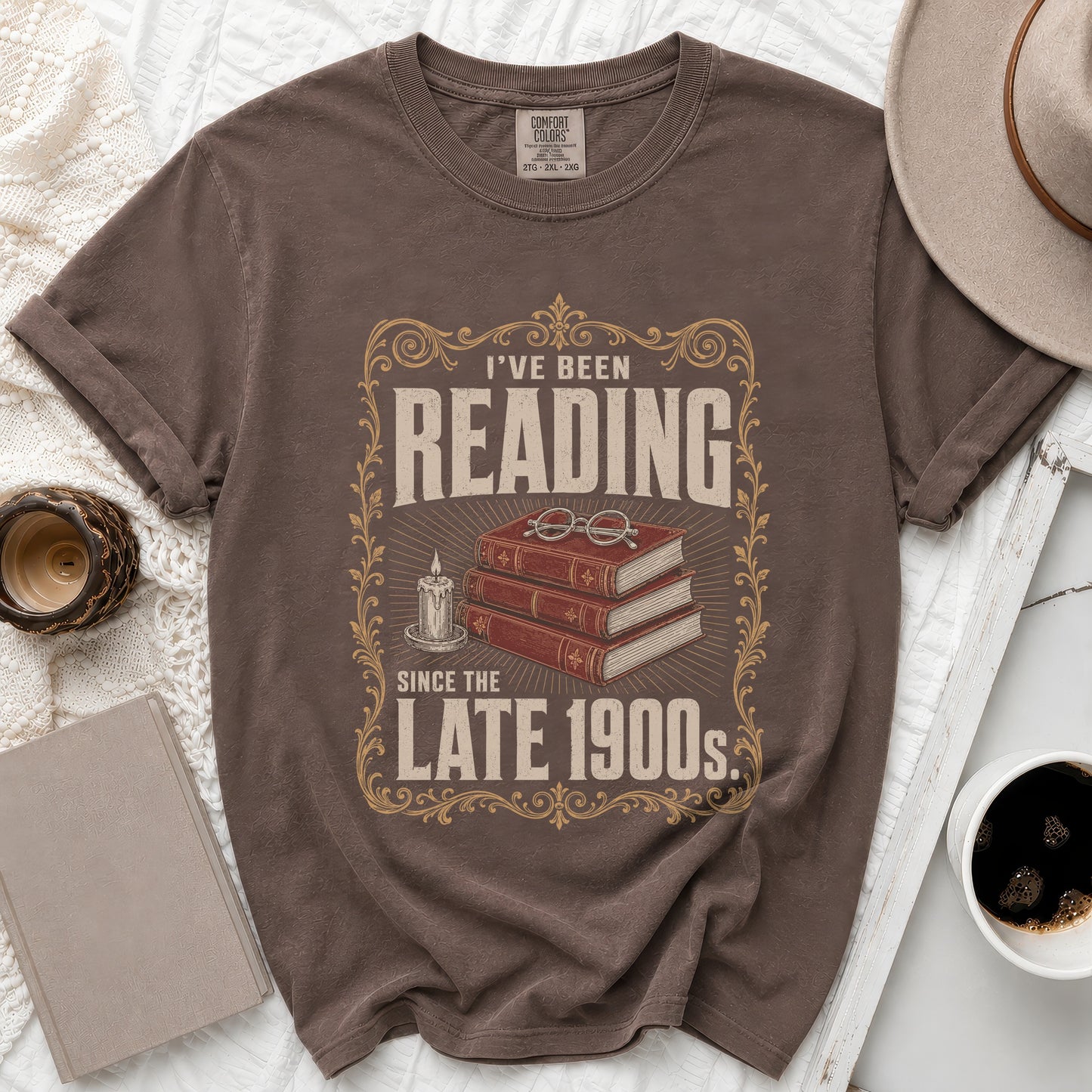Brown t-shirt with "I've Been Reading Since the Late 1900s" text and graphic.