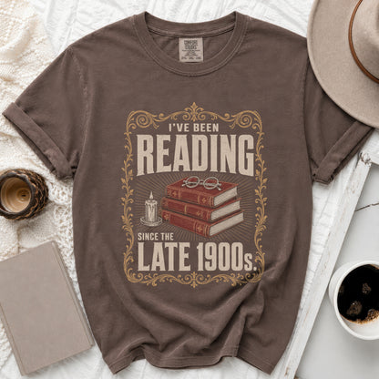 Brown t-shirt with "I've Been Reading Since the Late 1900s" text and graphic.