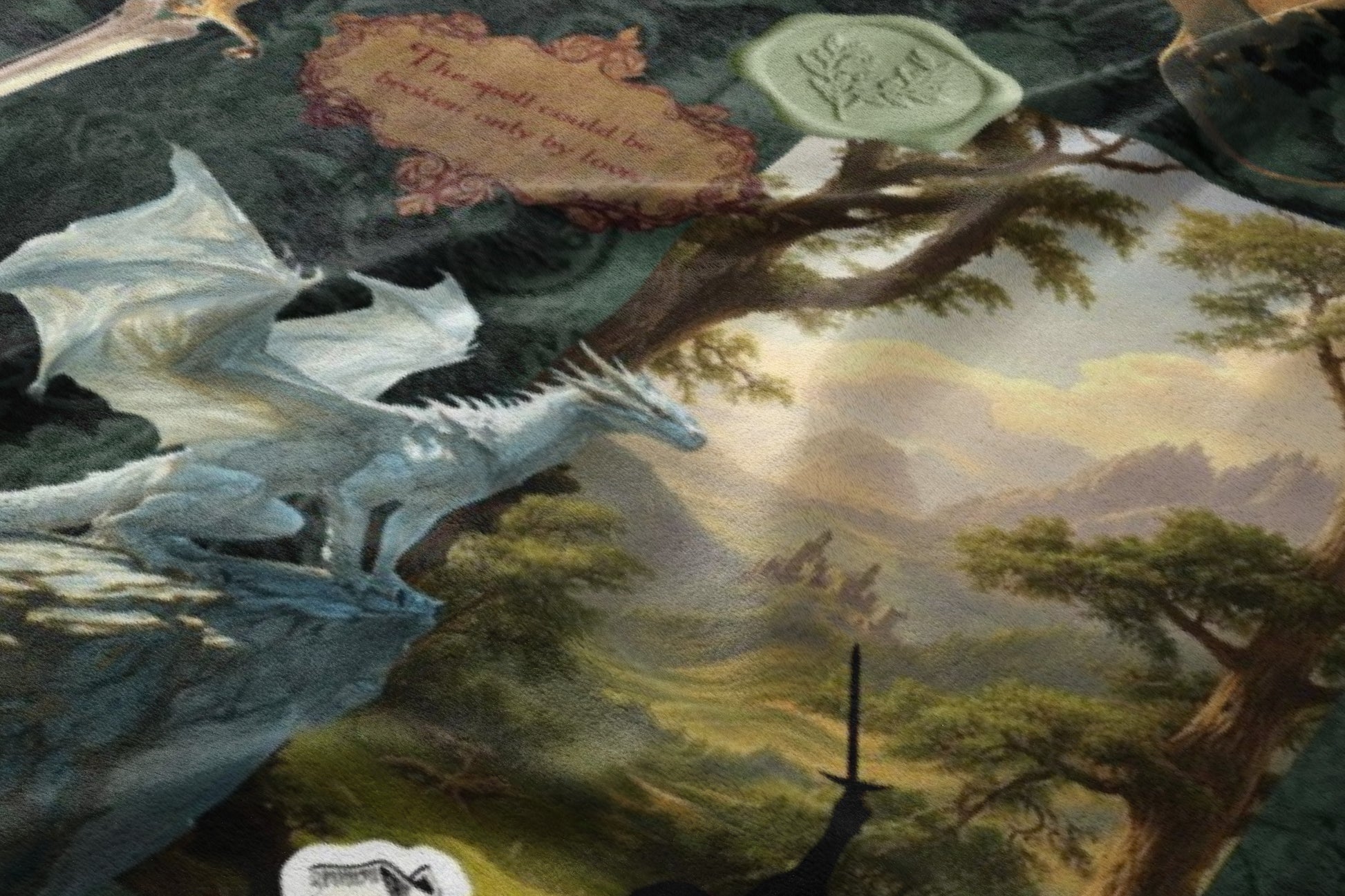 White dragon resting on cliff with misty mountains and forest. Spell text visible.