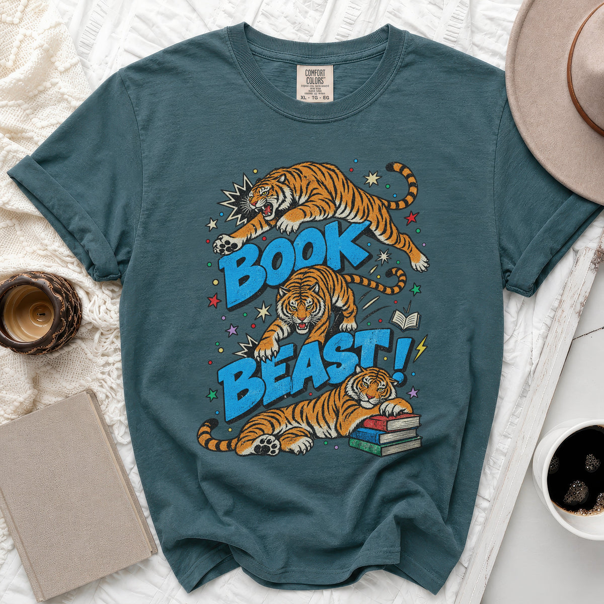 Teal t-shirt with three tigers and "BOOK BEAST!" text in bold blue letters.