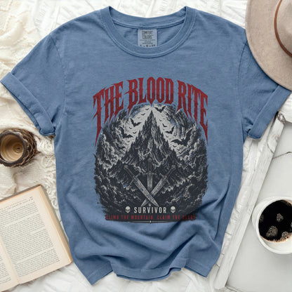 Blue t-shirt with "The Blood Rite Survivor" graphic and swords.