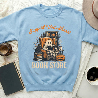 Light blue sweatshirt with a ghost reading