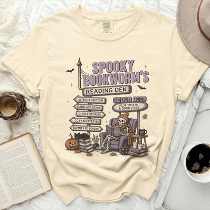 T-shirt with "Spooky Bookworm's Reading Den" and genre signposts.