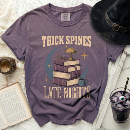 Thick spines late nights graphic tee with books, lamp, and moon.