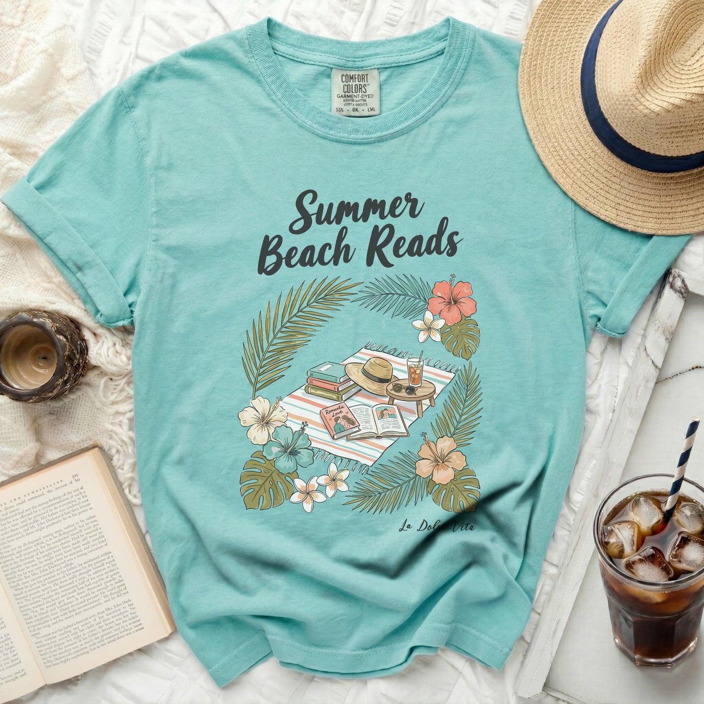 T-shirt with "Summer Beach Reads" book and floral design.