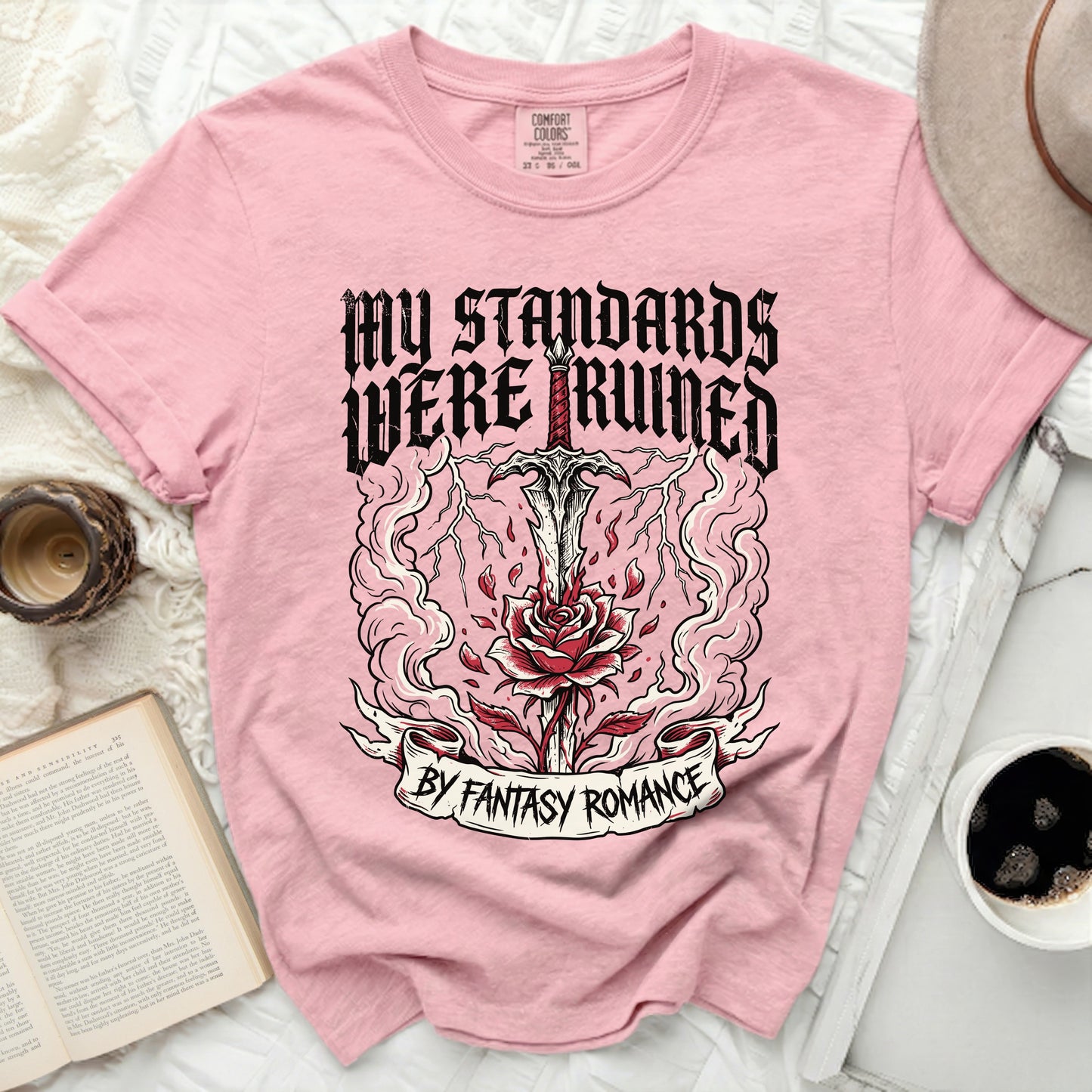 Pink t-shirt with graphic "My standards were ruined by fantasy romance"