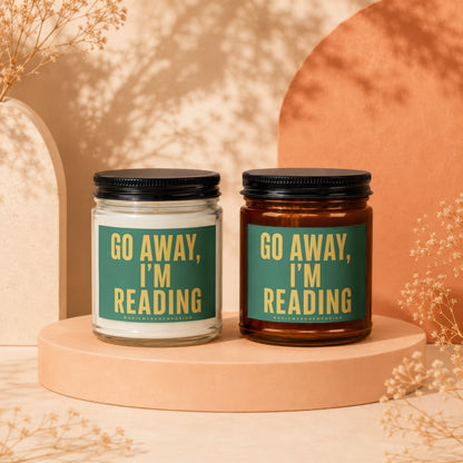 Two candles sit side-by-side with "GO AWAY, I'M READING" text.
