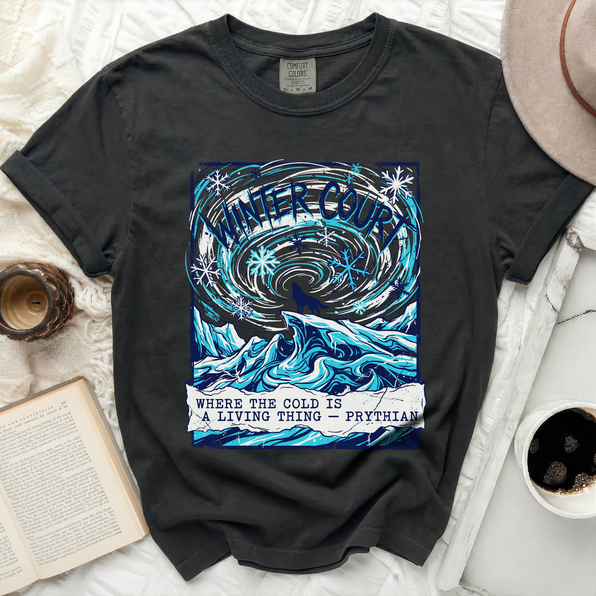 Dark t-shirt with "Winter Court" and "Where the cold is a living thing" text.