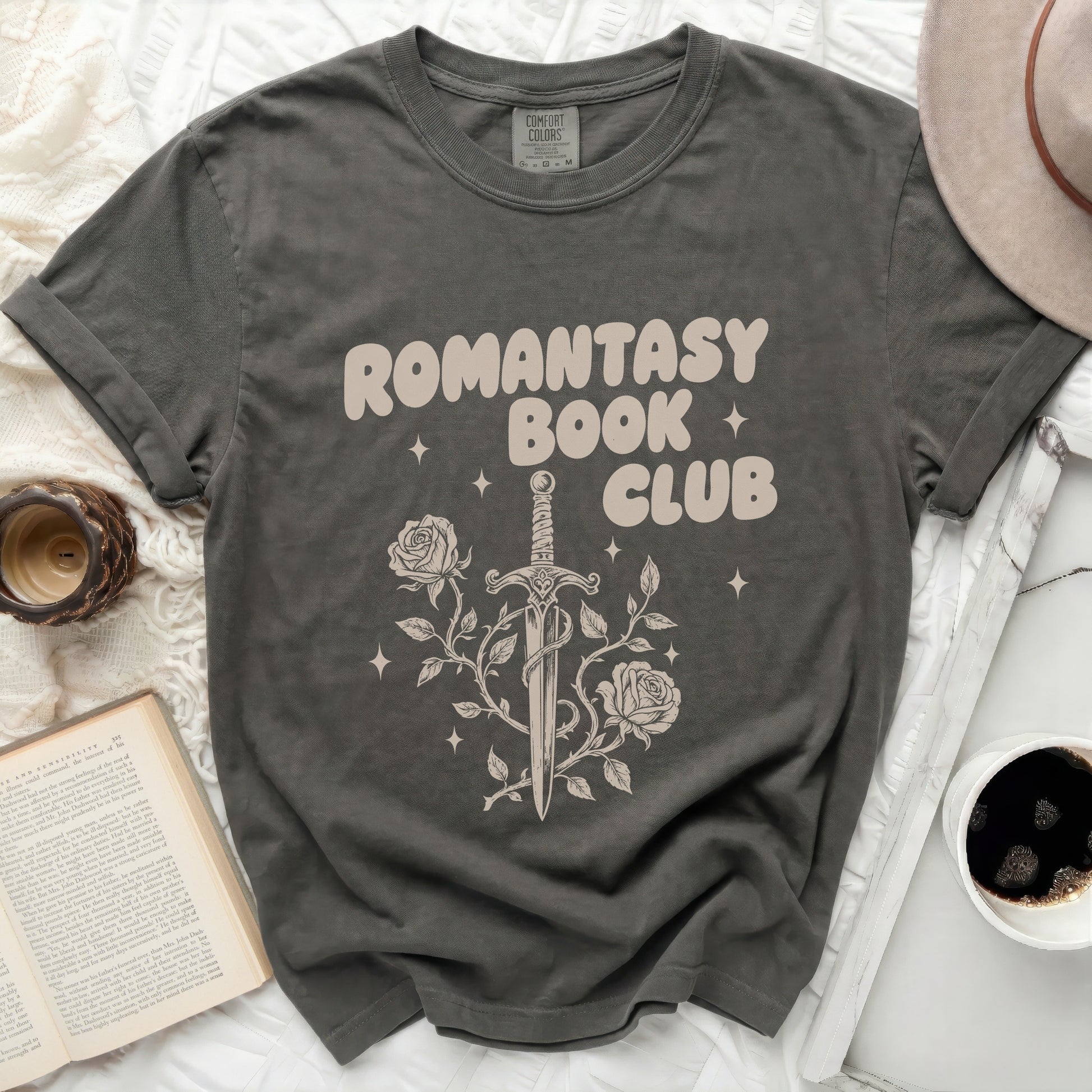 Grey t-shirt with "Romantasy Book Club" text and sword and roses design.