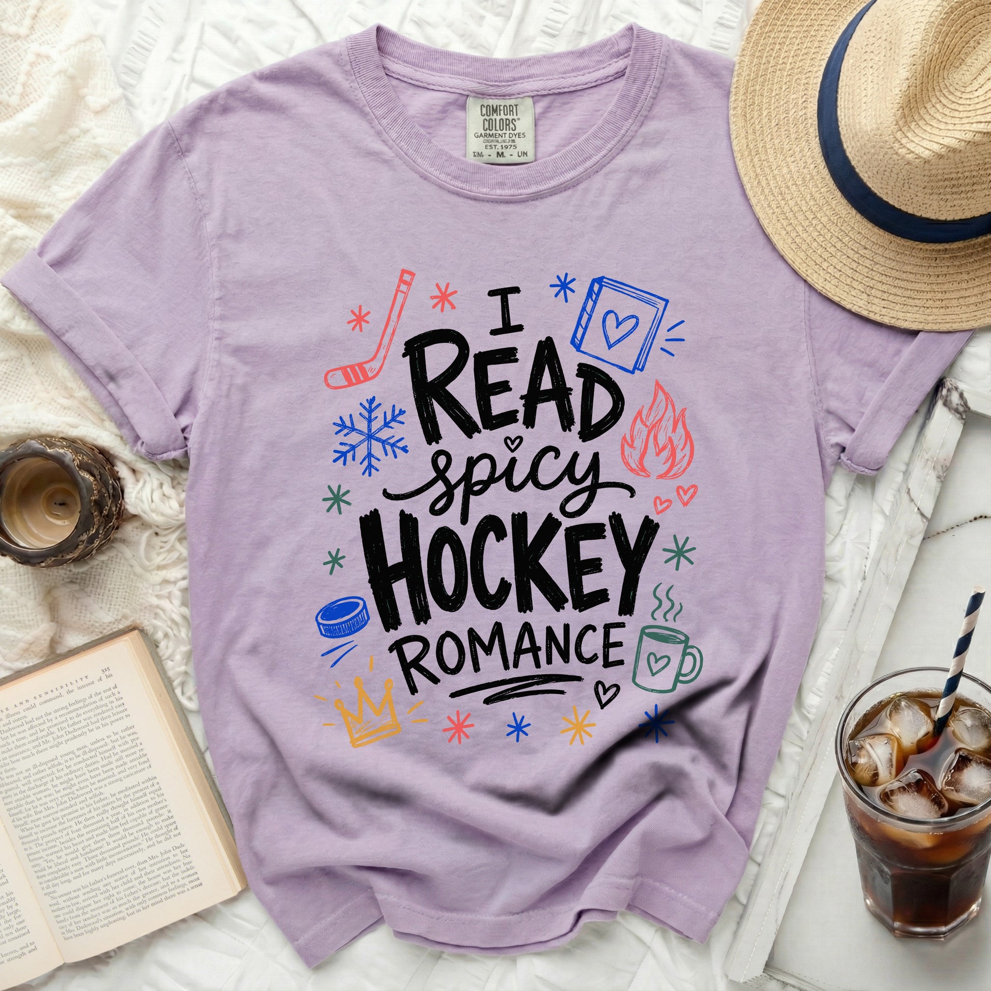 T-shirt with "Read Spicy Hockey Romance" text and graphics.