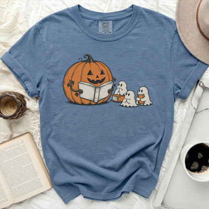 Pumpkin reading to ghosts, Comfort Colors tag visible.