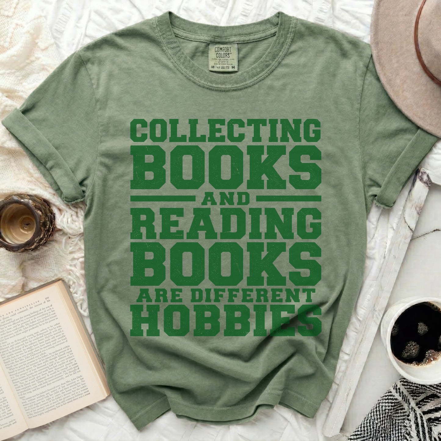 Green t-shirt with "Collecting Books and Reading Books Are Different Hobbies" text.