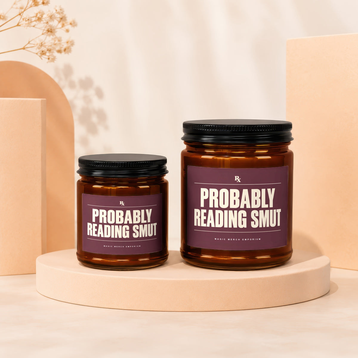 Two amber glass jars with black lids, one larger than the other, labeled "PROBABLY READING SMUT".