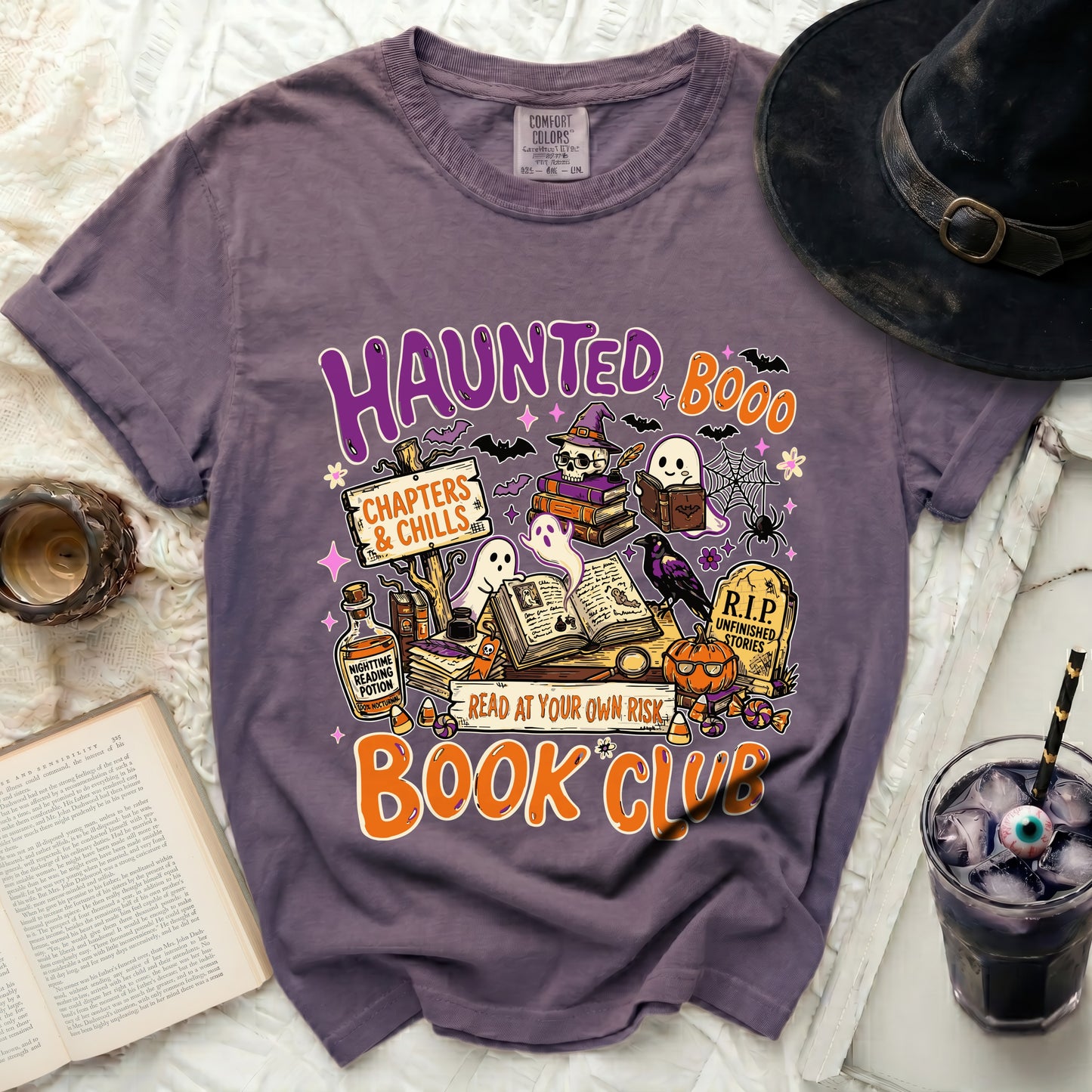Haunted Book Club graphic tee with Halloween illustrations and text.