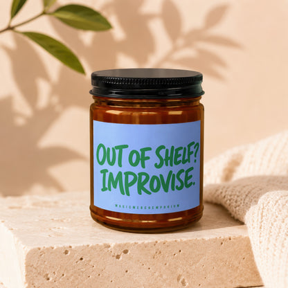 Candle with label reading "OUT OF SHELF? IMPROVISE. MAGICMERCH\"EMPORIUM".