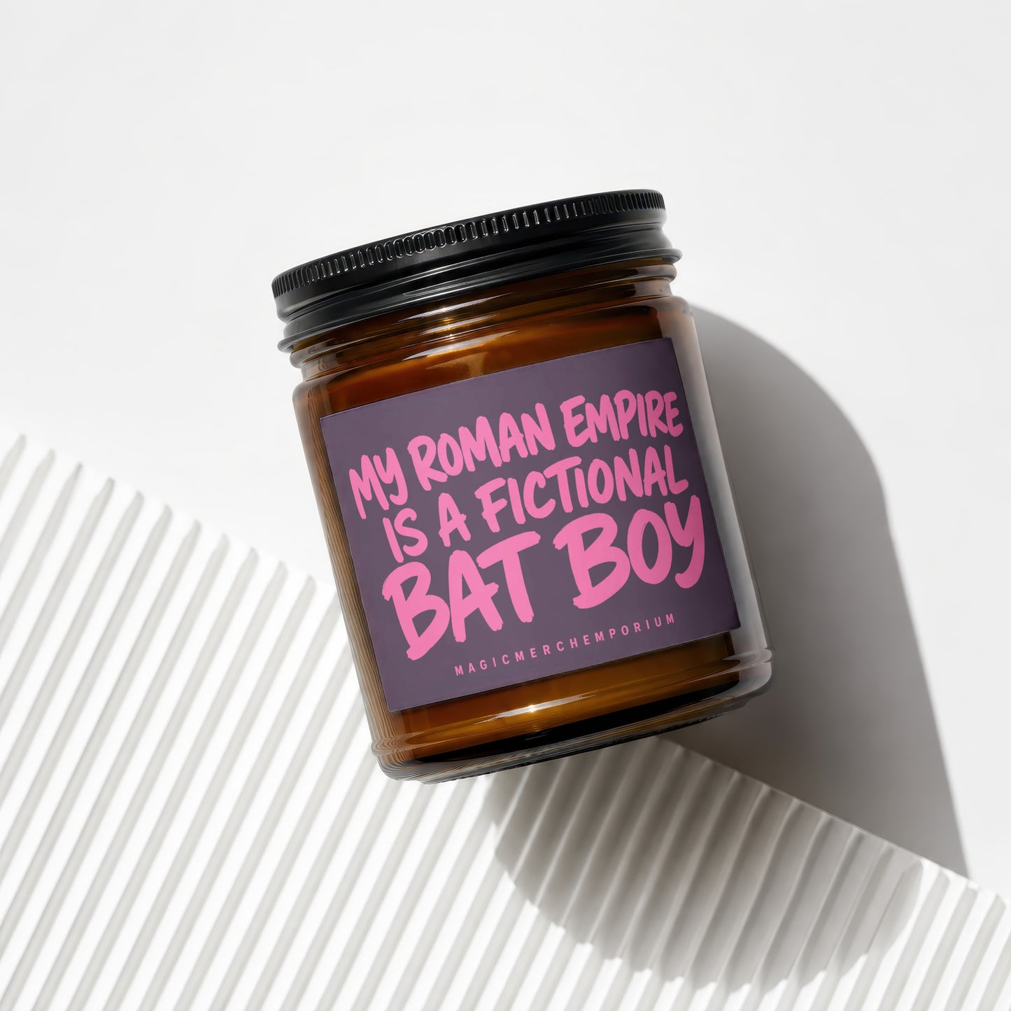 Glass jar candle with "My Roman Empire Is A Fictional Bat Boy" text.