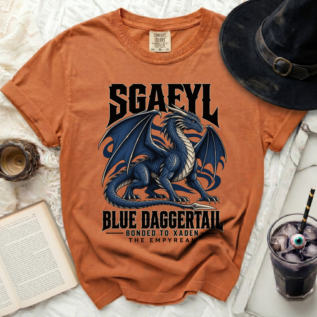 Orange t-shirt with blue dragon graphic and text "SGAFYL BLUE DAGGERTAI"