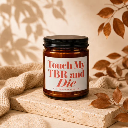 Brown glass candle with "Touch My TBR and Die" text.