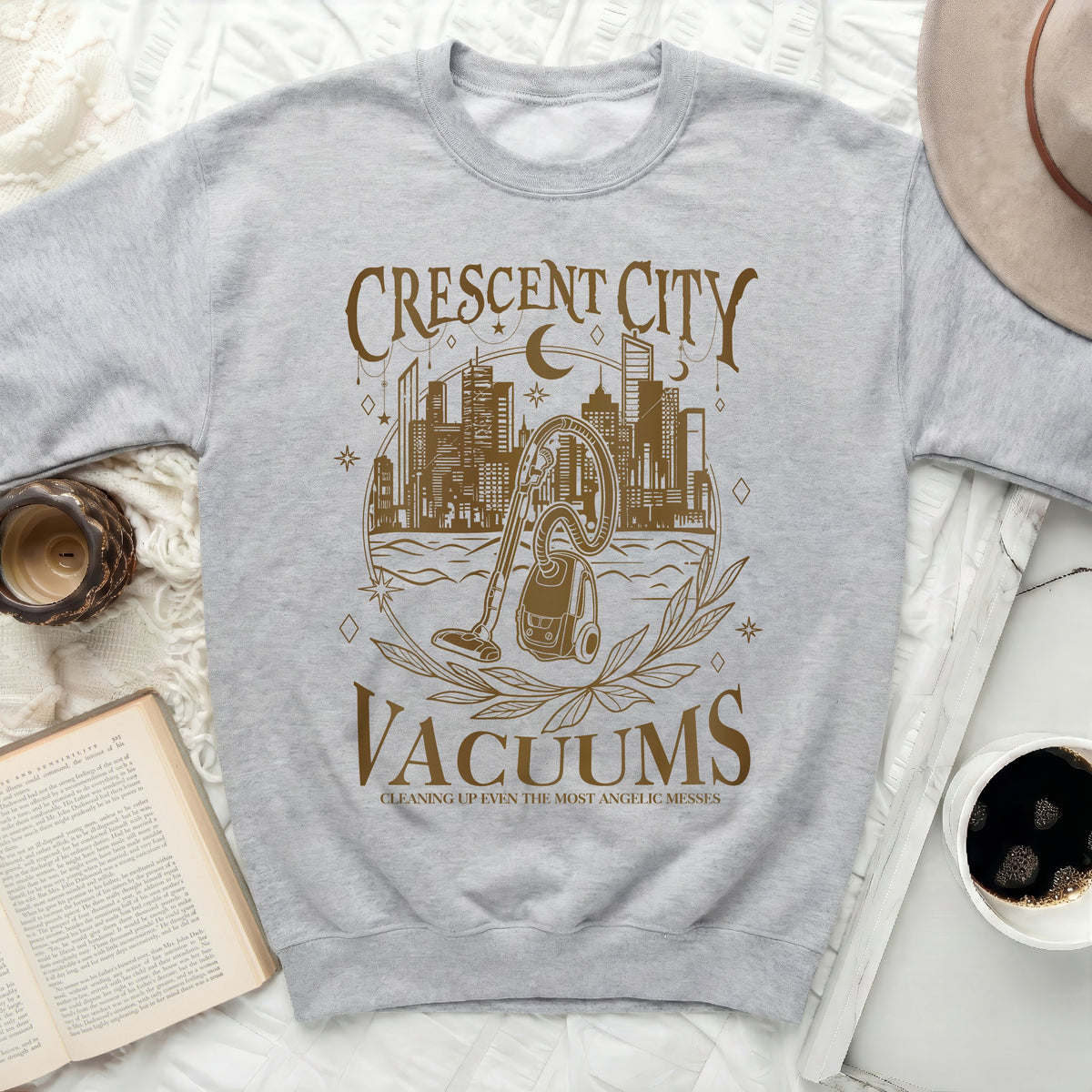 Gray sweatshirt with "Crescent City Vacuums" graphic and vacuum cleaner illustration.