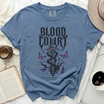 Blue t-shirt with "Blood Court" text and ornate sword and butterflies.