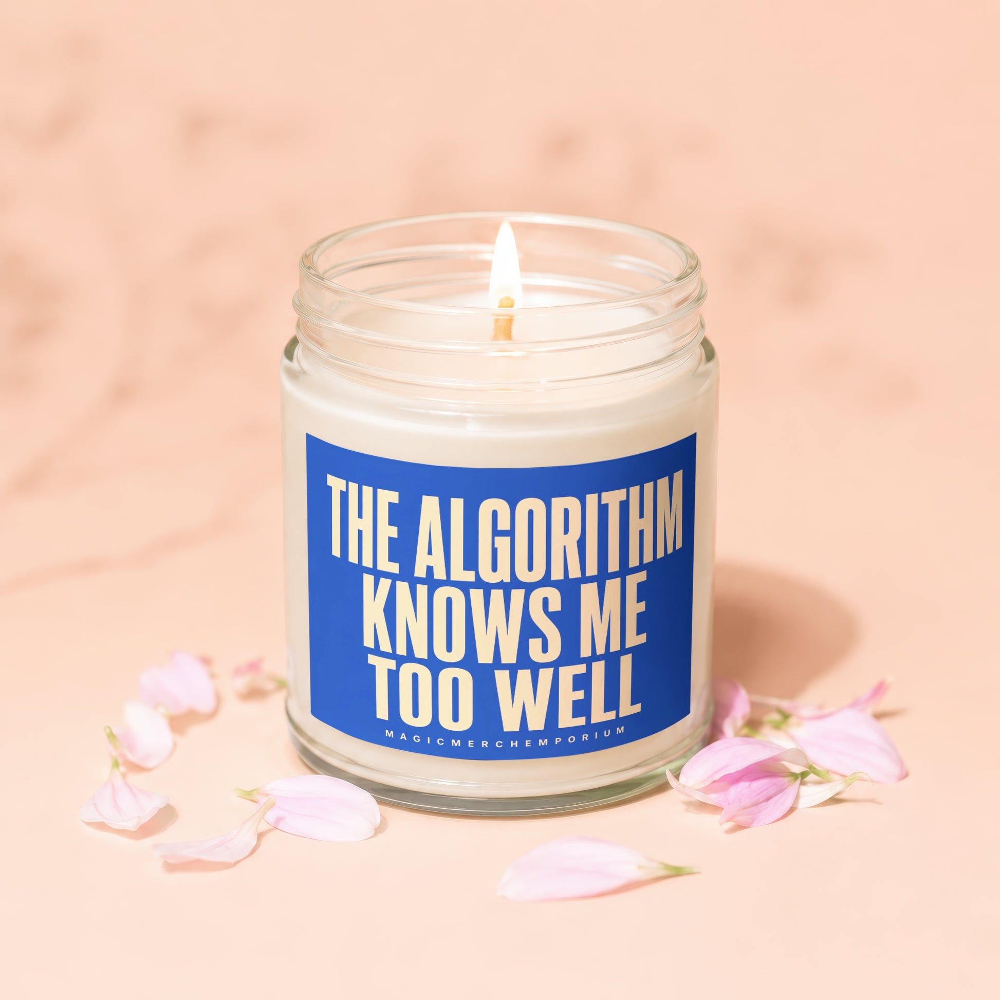 Candle with blue label reading THE ALGORITHM KNOWS ME TOO WELL.