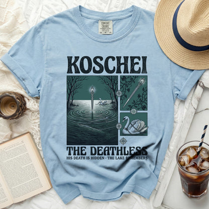 Light blue t-shirt with "KOSCHEI THE DEATHLESS" graphic and swan illustration.