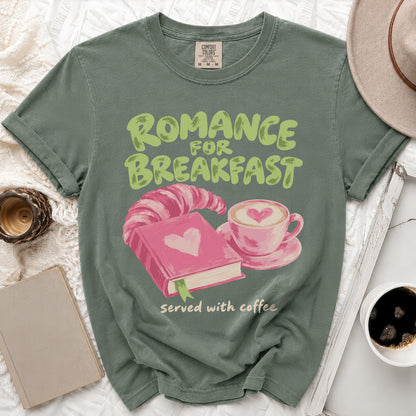 Green t-shirt with "Romance for Breakfast served with coffee" text and book graphic.