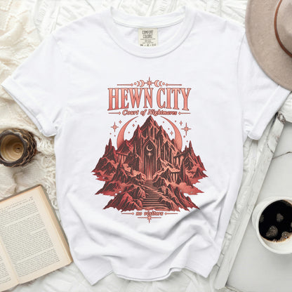 White t-shirt with "HEWN CITY Court of Nightmares" and castle graphic.
