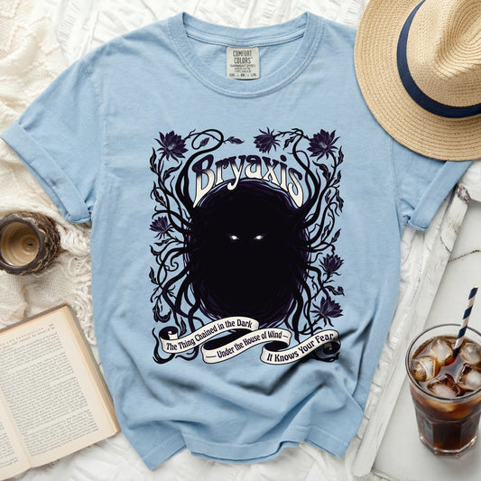Light blue t-shirt with black "Bryaxis" artwork and quote.