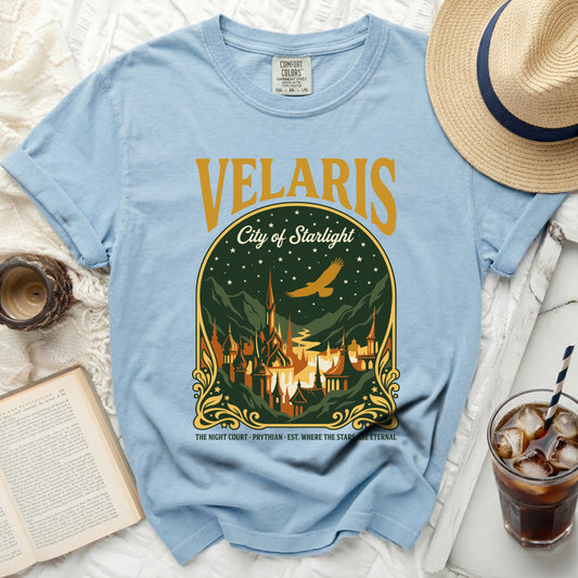 Light blue t-shirt featuring "Velaris City of Starlight" and a fantasy city illustration.