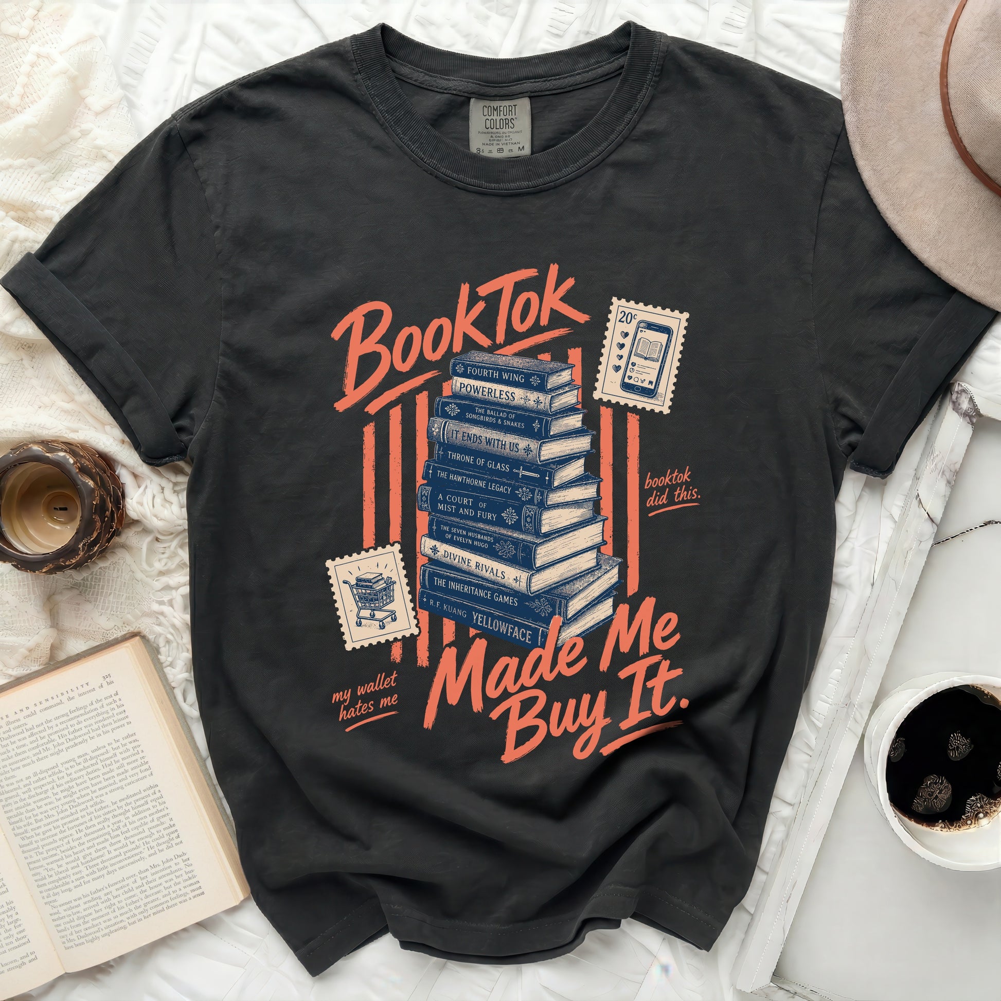 BookTok graphic tee with stacked books and "Made Me Buy It" text.